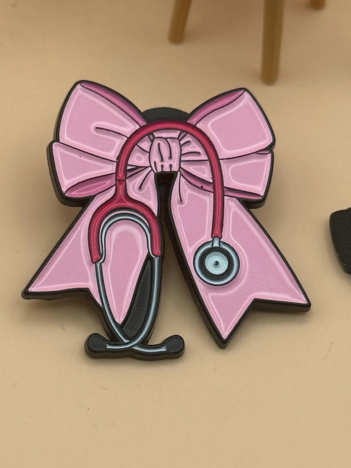 Bow and Stethoscope Enamel Pin