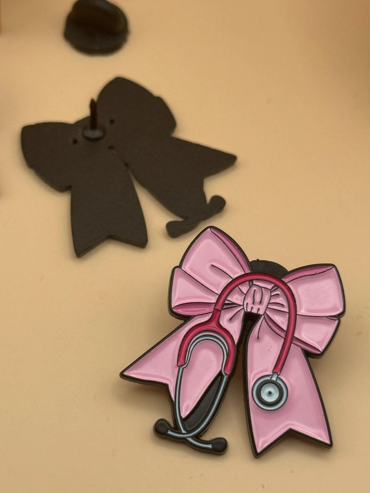Bow and Stethoscope Enamel Pin