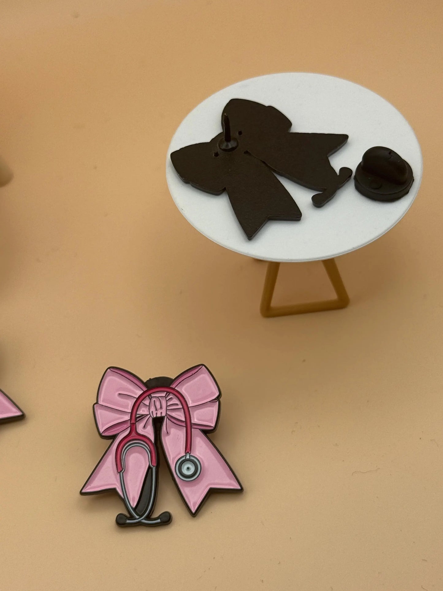 Bow and Stethoscope Enamel Pin